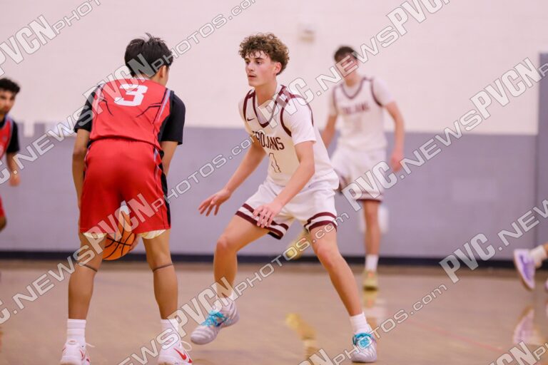 Trojans Battle Through Friday Doubleheader at Holiday Classic