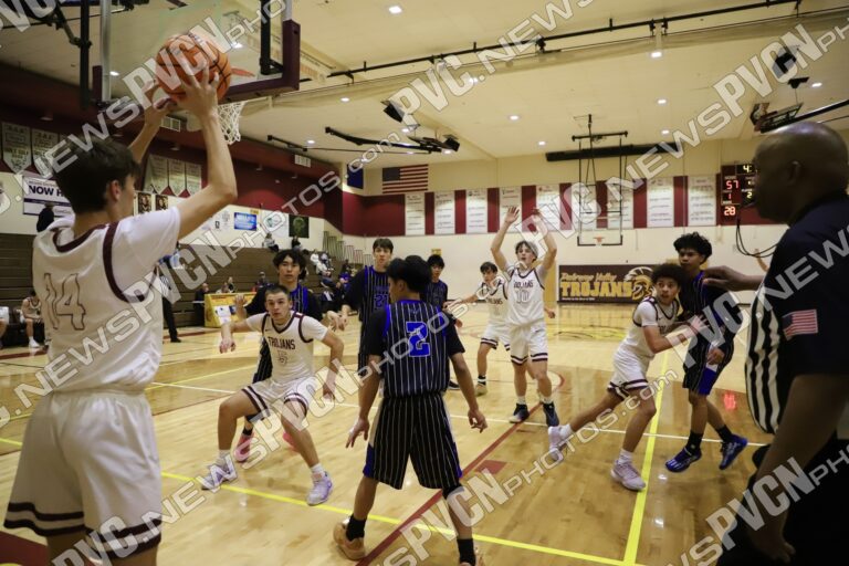 Trojans Turn Tight Contest Into Statement Win Over Coral Academy