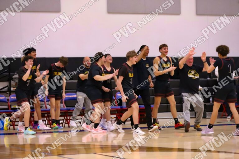 Late Threes Lift Trojans Past Guardians in Road Thriller