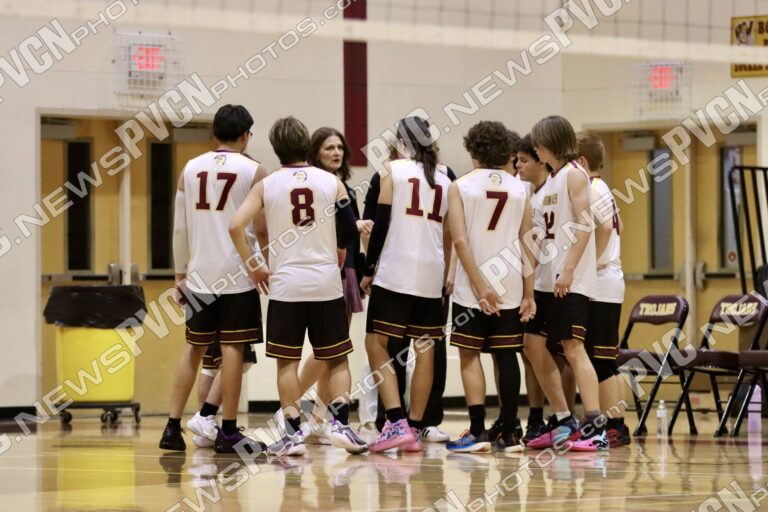 Trojans Open Boys Volleyball Season with Determined Effort Against Coral Academy