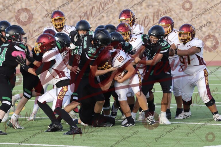 Trojans Keep Fighting in JV Football Game at Virgin Valley